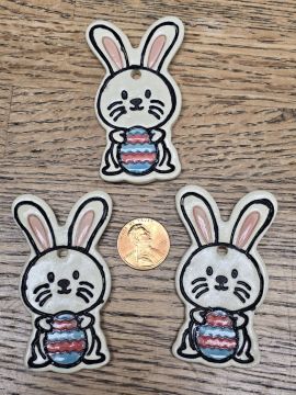 Ceramic Tie On Bunny Holding an Easter Egg